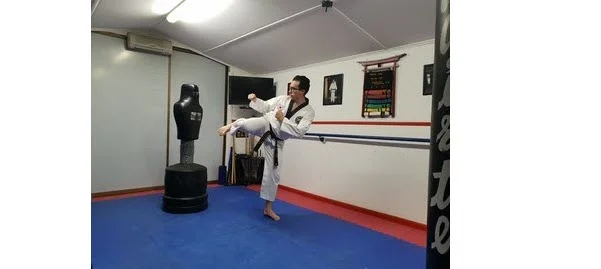 Instructor doing a demo on to rotate hips